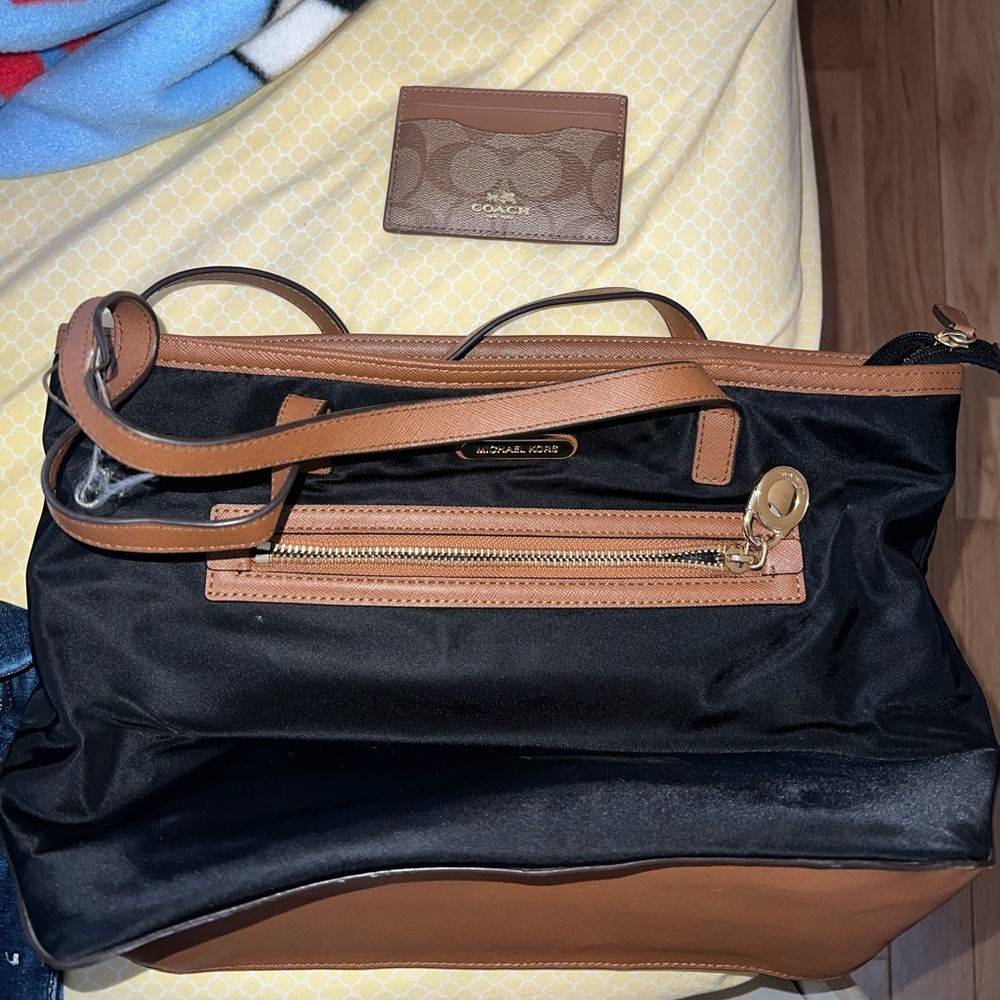 Black and Tan Michael Kors vinyl shoulder bag . Coach card holder included